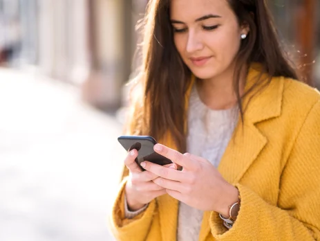 Portrait of a beautiful woman using a mobile