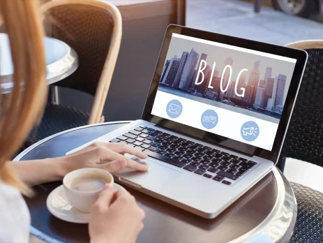 woman reading blog online on computer