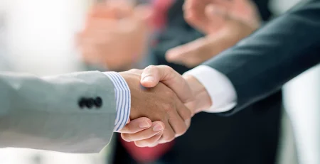 Two businessmen shaking hands