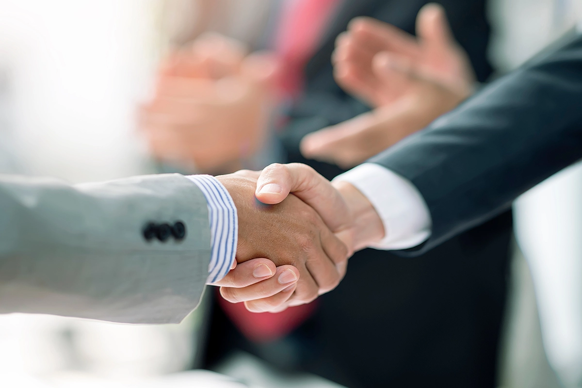 Two businessmen shaking hands